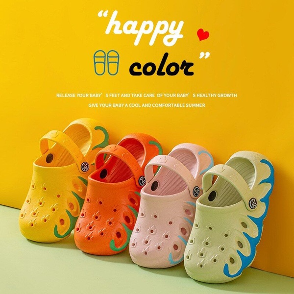A clean, studio-lit display of four colorful children's clogs in a row against a vibrant yellow background, emphasizing summer fun and comfort.