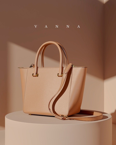 A high-end, clean studio shot of a leather handbag presented on a minimalist platform with warm, natural lighting.