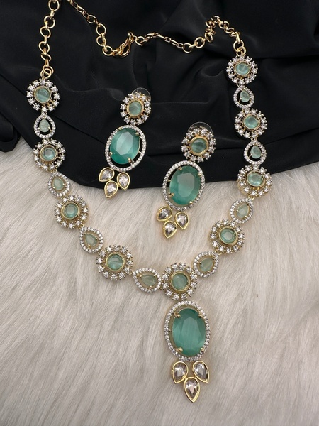 This creative showcases a high-quality necklace and earring set arranged on a premium black cloth and faux fur background to emphasize luxury.