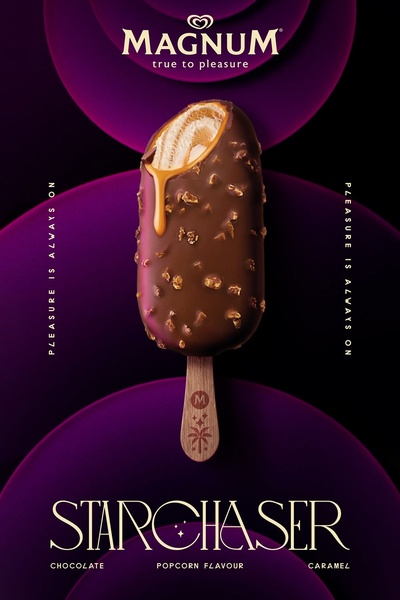 A high-end, vertically oriented product hero shot of a chocolate-covered popcorn ice cream bar, featuring a melting caramel center against a deep purple minimalist background.
