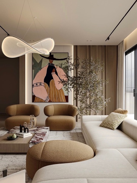 A high-end living room featuring a modern armchair, a plush sofa, and a unique artistic pendant light, set against warm, neutral tones.