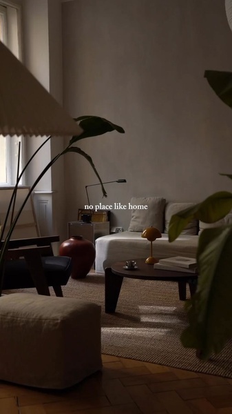 A high-end 9:16 vertical creative focusing on a warm, ambient interior shot featuring a mushroom lamp as the central focus.