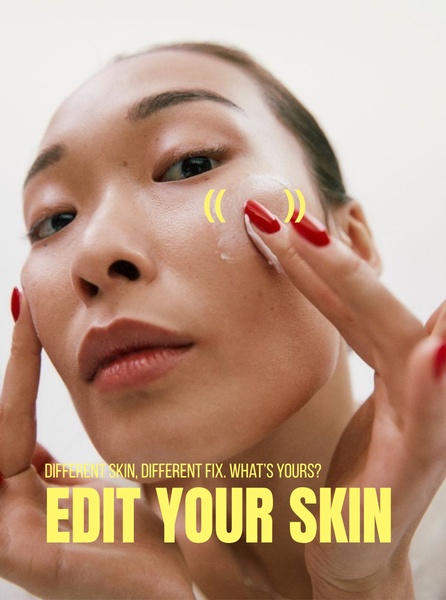 A close-up shot of a model applying face cream to emphasize personalization and direct, effective skincare solutions.