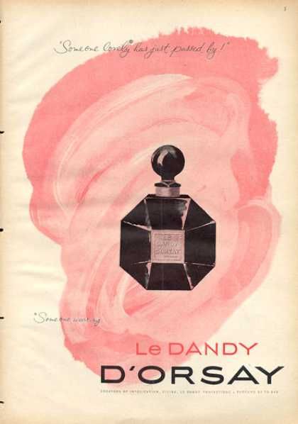 A high-end perfume advertisement featuring a dark, elegant bottle set against a soft, abstract pink wash background.