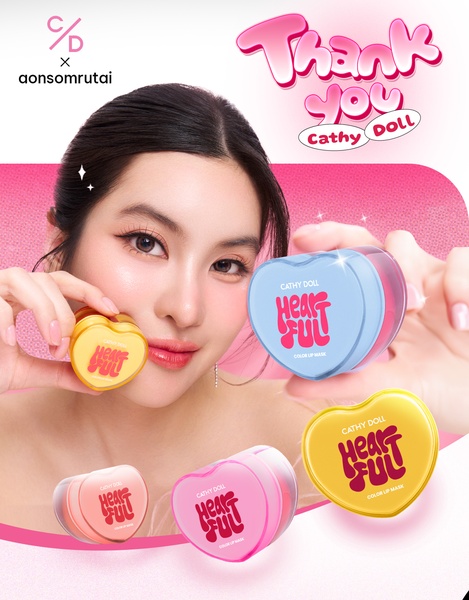 A vibrant beauty creative featuring a model holding heart-shaped lip mask containers, utilizing a bright, playful color palette to evoke brand warmth.