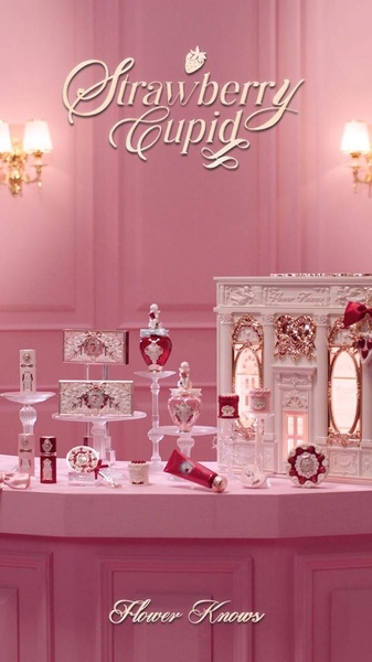 A refined, romantic display of a makeup product collection set in a pink, ornate environment to evoke luxury and charm.
