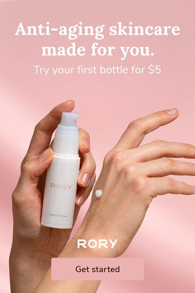 A clean, high-contrast product shot of a bottle of skincare being held, featuring a direct monetary offer.