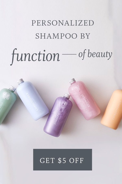 A clean, high-angle product photography shot showcasing five unique shampoo and conditioner bottles in a row with a subtle discount offer below.