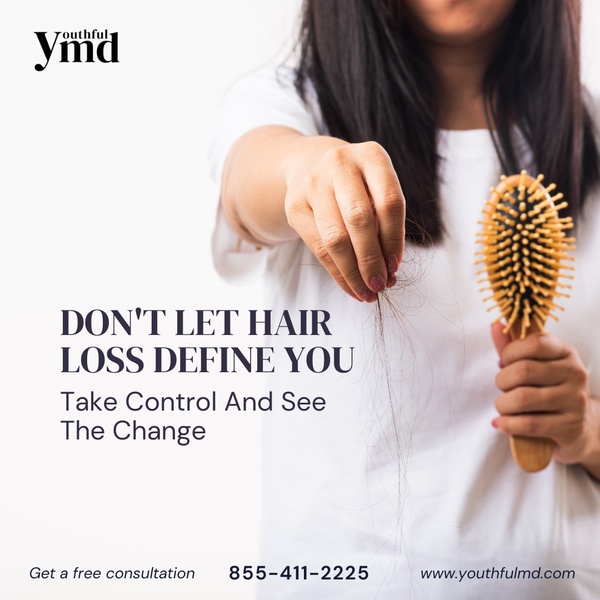 A high-contrast visual featuring a person holding fallen hair and a brush, focusing on the emotional pain point of hair loss.