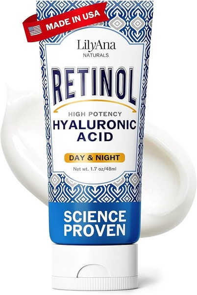A high-contrast, professional studio product shot featuring a tube of retinol cream against a clean, white cream splash background.