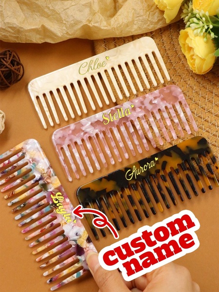 A flat-lay product showcase featuring three different hair combs with customized names, highlighting the personal touch of the product.