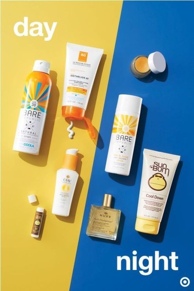 A flat-lay product organization split by color representing day and night, featuring various skincare bottles and tubes.