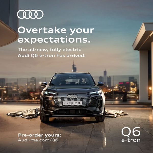 A dark-toned, moody shot of a new electric SUV at sunset, emphasizing a premium lifestyle and bold promise.
