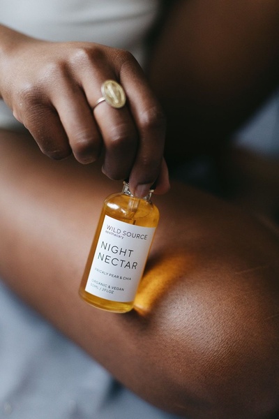 body oil, skin oil, moisturizing oil, beauty oil, skincare oil, massage oil, organic oil, brand awareness, lifestyle, warm, luxurious, orange, neutral