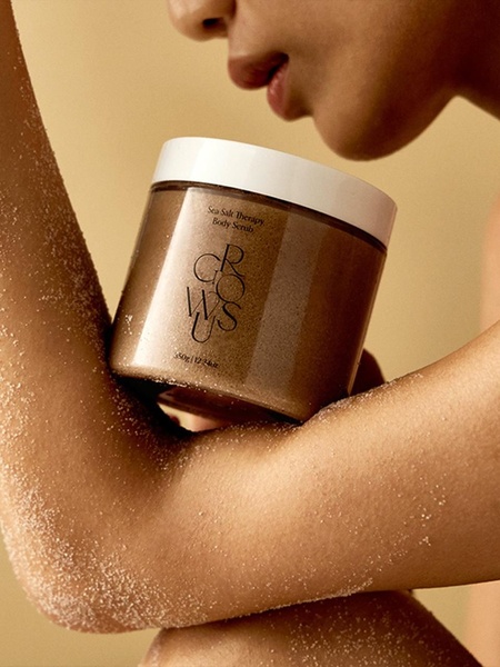 body scrub, exfoliating scrub, sea salt scrub, body exfoliant, skincare scrub, bath scrub, body polish, product launch, lifestyle, luxurious, warm, brown, gold