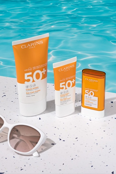 sunscreen, sun protection, spf cream, sunblock, sun care, product launch, lifestyle, fresh, warm, blue, orange, summer sale
