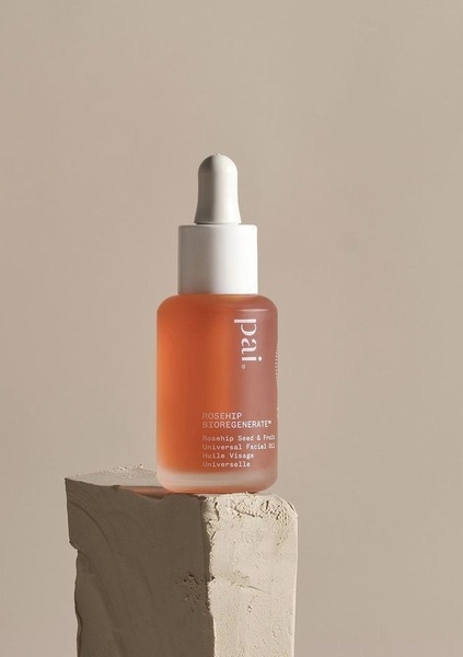 facial oil, face oil, skincare oil, rosehip oil, beauty oil, facial serum, skin oil, product launch, minimalist, calm, luxurious, orange, neutral