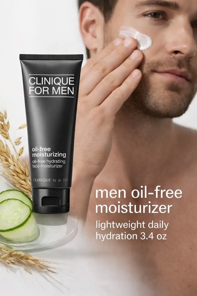A clean, minimalist product hero shot featuring the face moisturizer alongside natural ingredients like oats and cucumber to signal hydration.