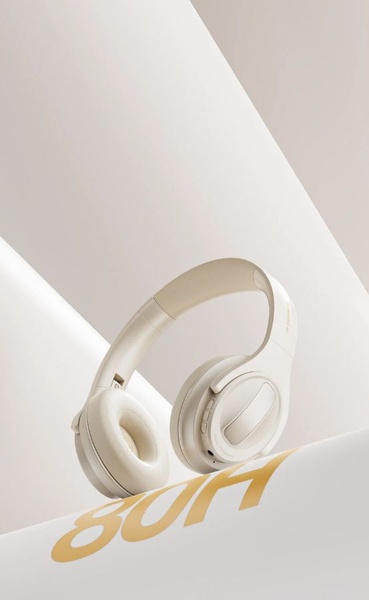 A clean, high-key studio photograph of wireless headphones emphasizing a long 80-hour battery life claim through elegant typography.