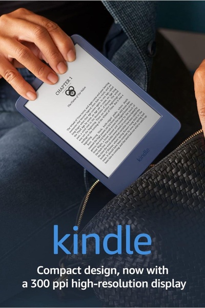 A close-up shot of a user holding a Kindle device, focusing on the clarity of the 300 ppi high-resolution display while reading.