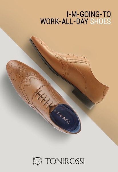 A minimalist studio shot of leather dress shoes featuring a bold, problem-solving headline focused on daily comfort.