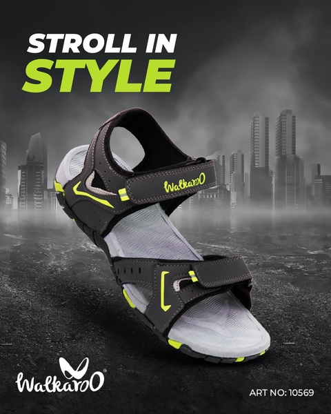 A stylized, urban-themed ad featuring a single walking sandal suspended against a dark, moody city skyline to emphasize lifestyle and design.