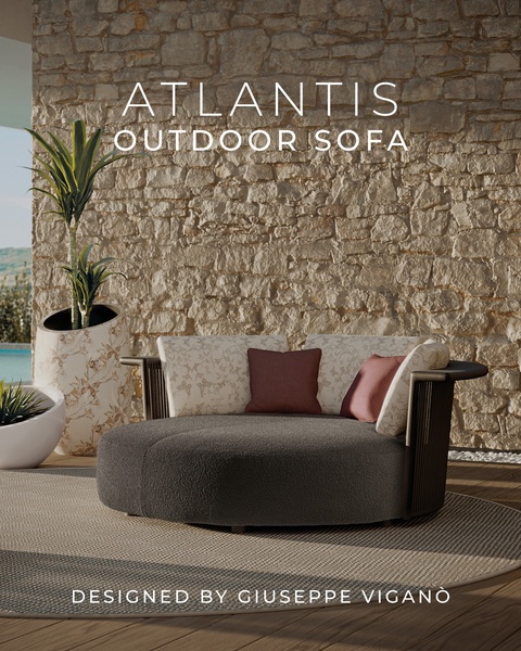 A high-end, minimalist advertisement featuring a circular outdoor sofa set against a textured stone wall, conveying luxury and comfort.