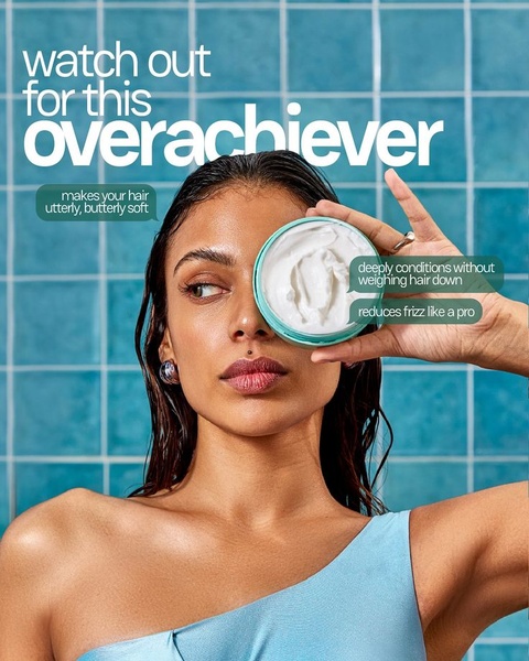 A high-contrast, benefit-led creative showcasing a hair conditioner tub with descriptive copy callouts pointing directly to product advantages.