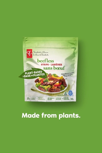 A clean, studio-lit shot of a beefless strips product pouch centered against a solid green background, emphasizing a simple ingredient-focused message.