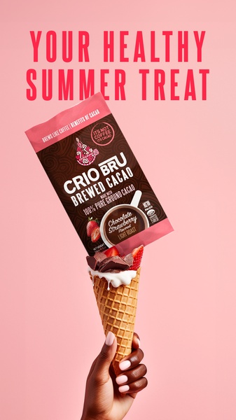 A vertically-oriented creative featuring a brewed cacao bag transformed into an ice cream cone held by a hand against a pink background.