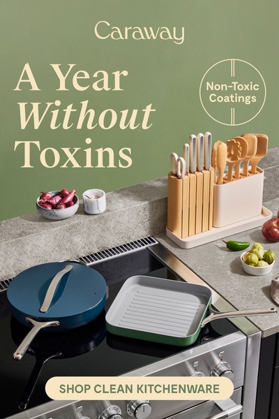 This static creative showcases a clean, organized kitchen countertop featuring a premium non-toxic cookware set with a bold lifestyle-focused headline.