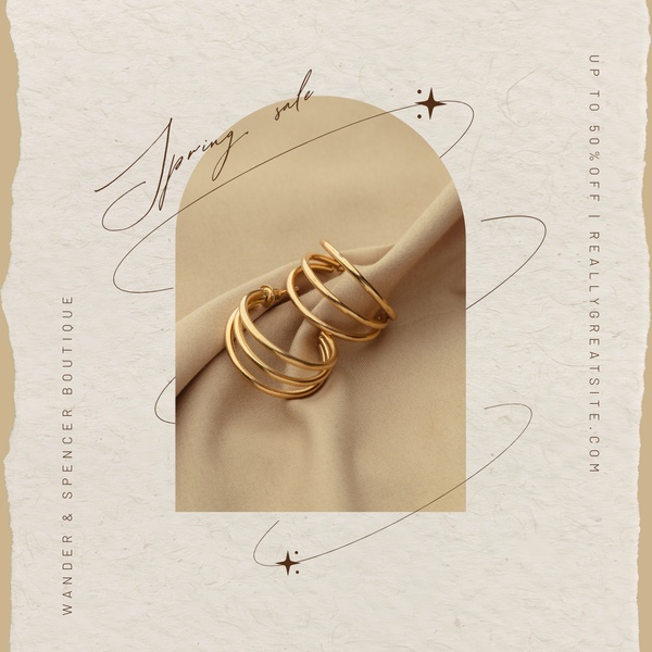 A minimalist, high-end presentation of gold hoop earrings featuring a neutral textured background and an elegant arched framing element.