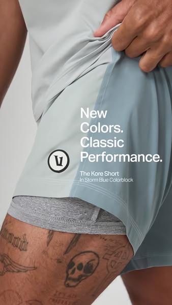 A close-up, high-quality product shot of running shorts highlighting the fabric and design details against a neutral background.