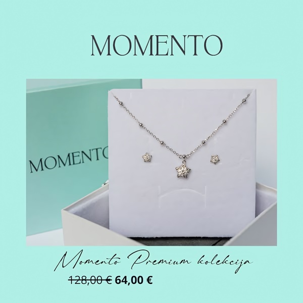 A clean, high-contrast display of a star-motif necklace and earring set in a branded gift box, featuring a price drop notification.