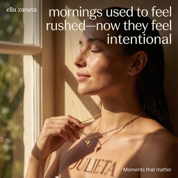 A close-up, warm-toned shot of a woman wearing a gold necklace, using natural morning light to create a sense of calm and intentionality.