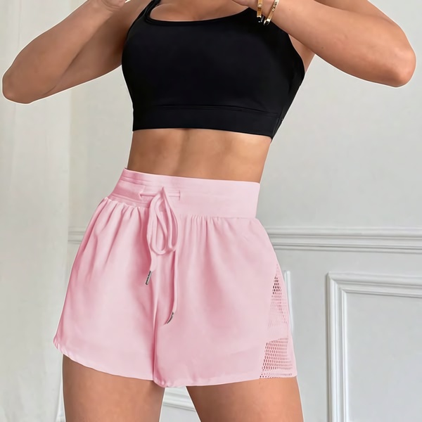 A focused, high-contrast shot of the product on a model, emphasizing fit and design in a clean, professional studio environment.