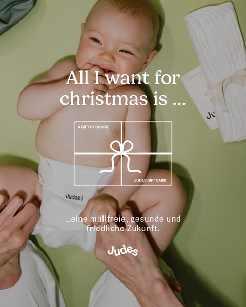 A close-up, top-down shot of a baby wearing a reusable diaper, presented as a gift-giving opportunity for a sustainable future.
