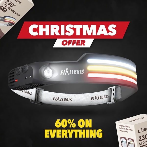 This square format ad highlights a holiday discount for a wide-angle LED headlamp, using high-contrast text and a centered product shot.