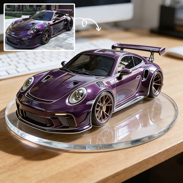 A split-view image showing a real luxury sports car and its high-fidelity diecast model replica on a rotating display stand.