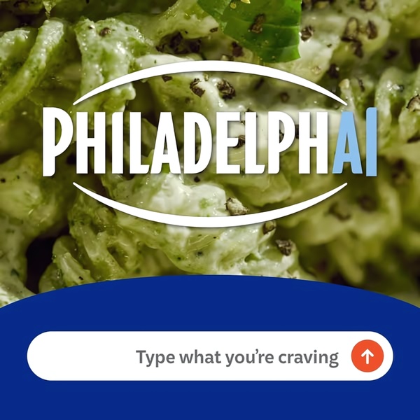 A close-up of a creamy pasta dish paired with an interactive search bar interface that invites users to input their specific food cravings.
