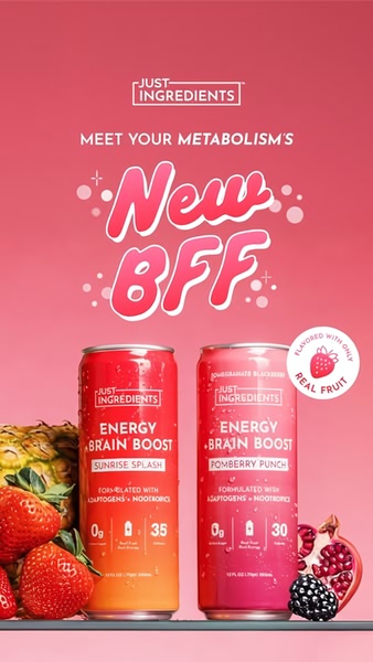 A vibrant 9:16 vertical creative featuring two cans of energy drink surrounded by fresh ingredients like strawberries, pineapple, and pomegranate.