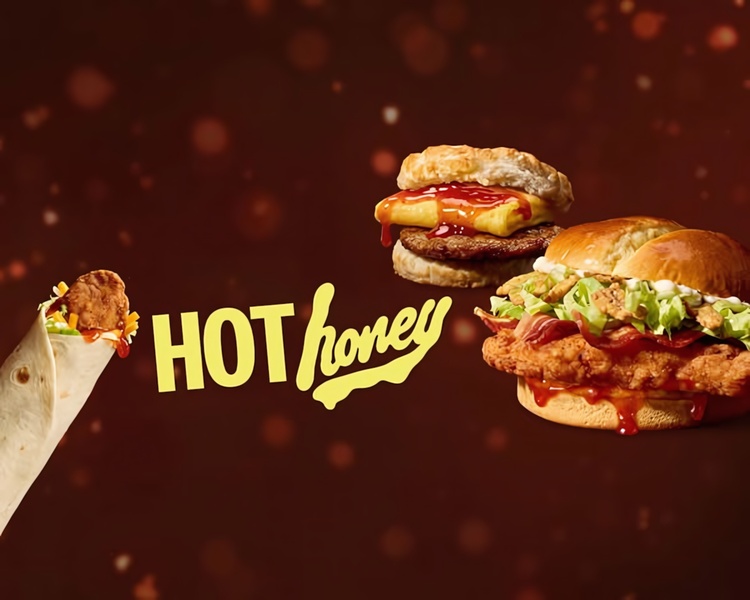 A high-impact ad featuring three different menu items surrounded by stylized, flowing text and a dark, atmospheric background.