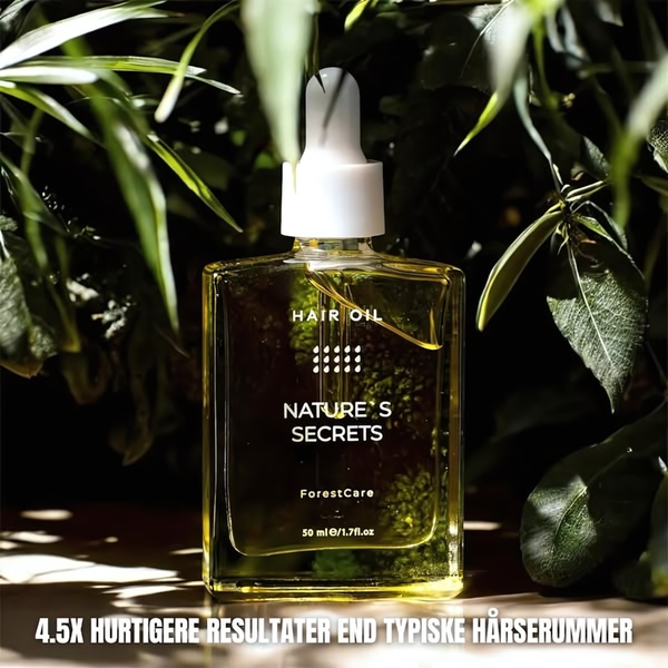 A close-up product shot of a hair oil bottle set against a lush, green natural background with a bold claim about efficiency.