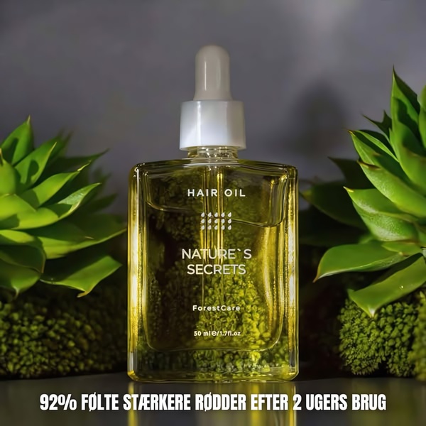 A high-performance ad creative featuring a hair oil bottle centered between two succulents, emphasizing a clear statistical claim regarding product efficacy.