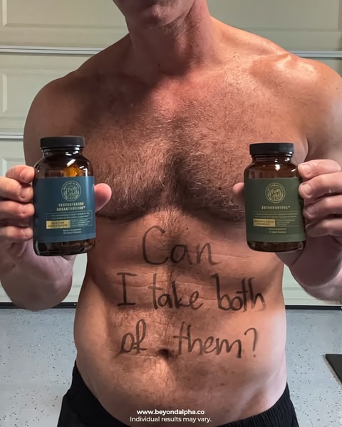 A shirtless individual holds two bottles of dietary supplements with the question 'Can I take both of them?' written directly on their torso.