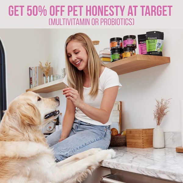 A lifestyle-oriented advertisement featuring a pet owner feeding a supplement to a Golden Retriever, highlighting a specific brand discount at a major retailer.