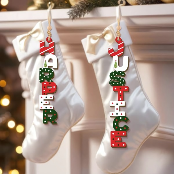 A high-quality 1:1 image showcasing two personalized Christmas stockings hung on a fireplace, emphasizing the festive aesthetic and custom text.