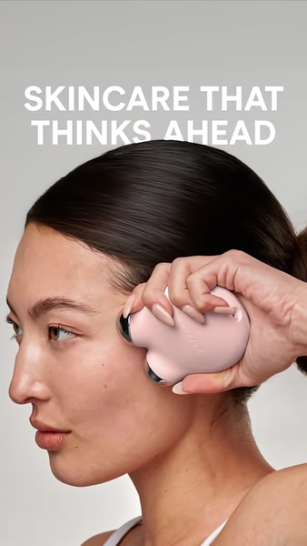 skincare device, facial massager, beauty tool, face roller, skincare gadget, product launch, brand awareness, minimalist, calm, luxurious, neutral, pink