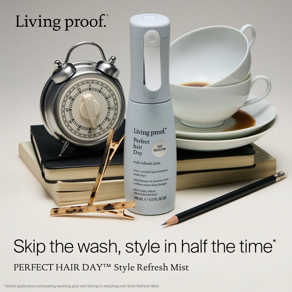 A clean, studio-lit composition featuring a Style Refresh Mist bottle alongside an alarm clock and coffee cups to visually communicate time-saving benefits.