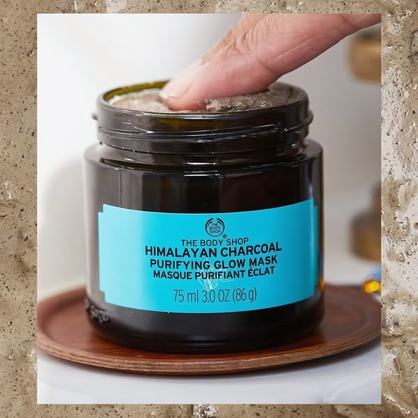 face mask, charcoal mask, purifying mask, skincare mask, clay mask, product demo, lifestyle, minimalist, calm, fresh, blue, neutral, brown
